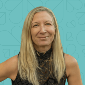 Headshot of Lana Starchuck on teal background.