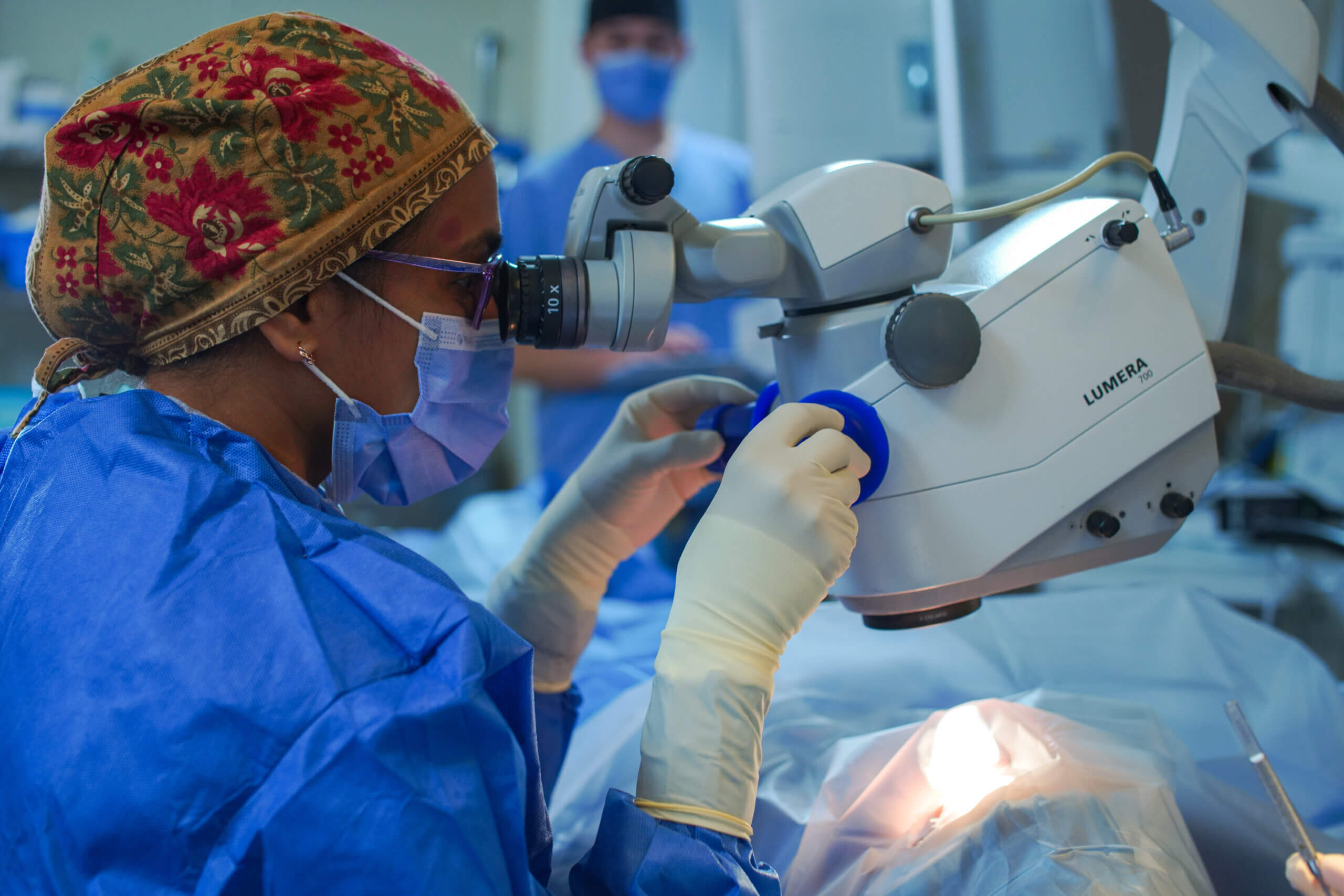 A surgeon performing eye surgery.